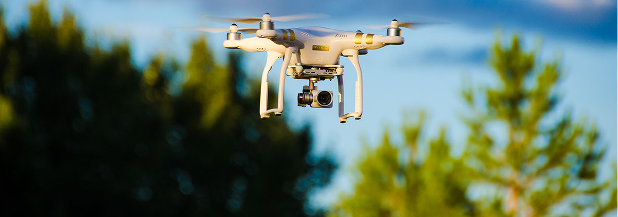 DJI Phantom 3 Professional Unmanned Aerial Vehicle ( UAV ) hovers durring a drone mission near Saskatoon, Saskatchewan, Canada