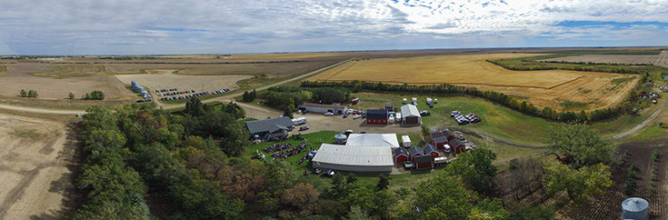 Panoramaic aerial drone image of a wedding setup in a farm yard near Regina Saskatchewan Canada